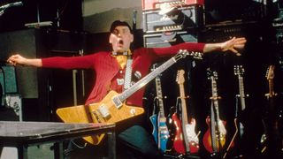 Rick Nielsen of the Rock group Cheap Trick performs at The Paradise on June 9, 1978 in Boston, Massachusetts.