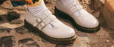 white leather dr martens with buckles 