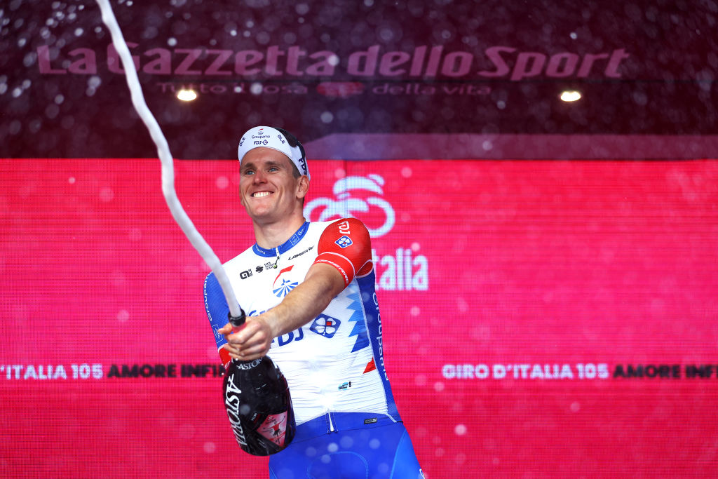 SCALEA ITALY MAY 12 Arnaud Demare of France and Team Groupama FDJ celebrates at podium with hampagne as stage winner during the 105th Giro dItalia 2022 Stage 6 a 192km stage from Palmi to Scalea Giro WorldTour on May 12 2022 in Scalea Italy Photo by Michael SteeleGetty Images