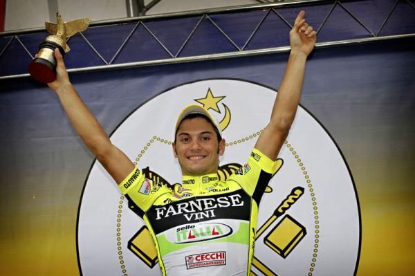Andrea Guardini (Farnese Vini-Selle Italia) on the podium after his fifth win in this year's race