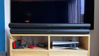 Sonos Arc Ultra with original Arc in front of a TV