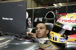 F1 Lewis Hamilton using Lenovo computer