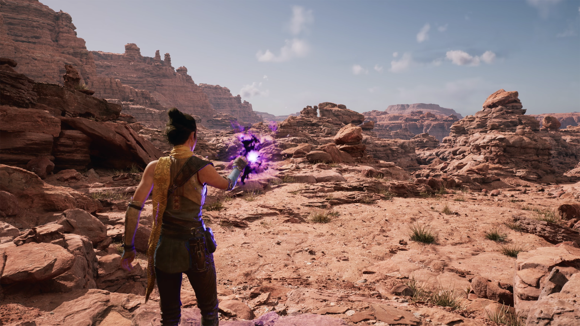 Screenshot from within Unreal Engine 5 of a character in front of a canyon landscape