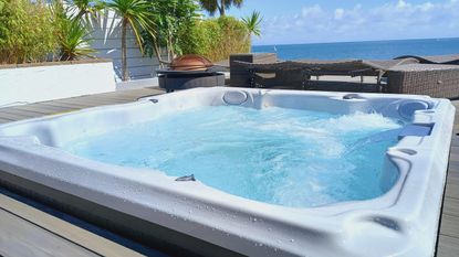 how to clean a hot tub filter - built-in hot tub on deck