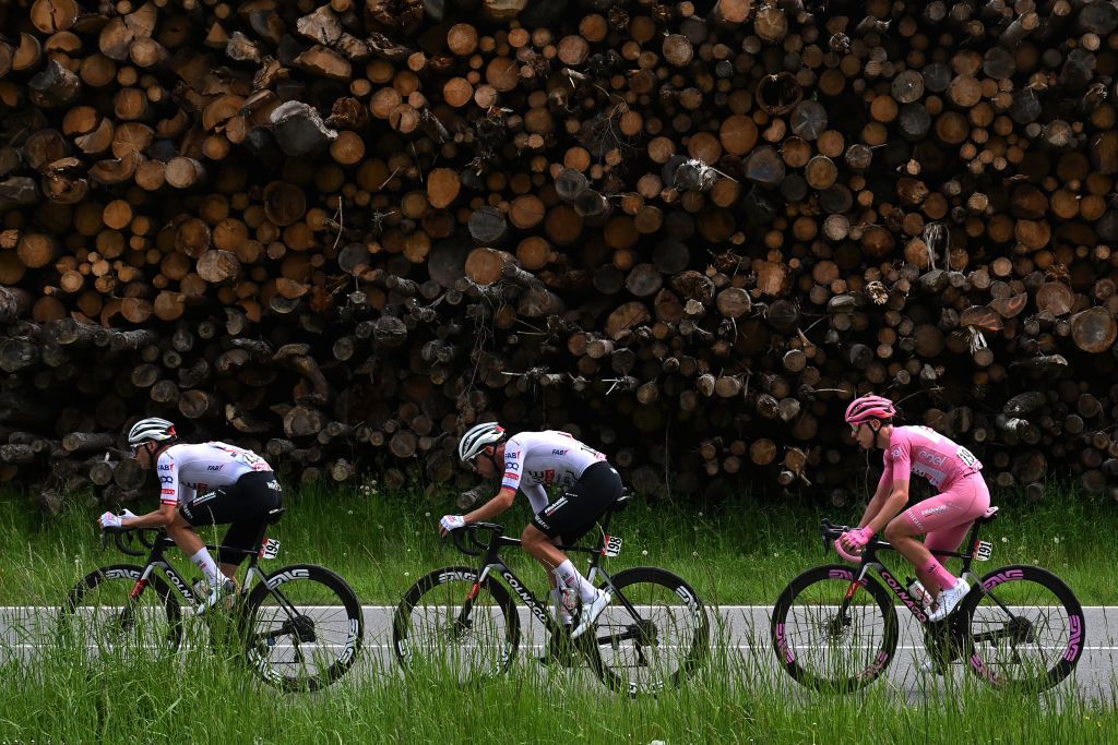 LIVIGNO MOTTOLINO ITALY MAY 19 LR Felix Grobschartner of Austria Domen Novak of Slovenia and Tadej Pogacar of Slovenia and UAE Team Emirates Pink Leader Jersey compete during the 107th Giro dItalia 2024 Stage 15 a 222km stage from Manerba del Garda to Livigno Mottolino 2387m UCIWT on May 19 2024 in Livigno Mottolino Italy Photo by Dario BelingheriGetty Images