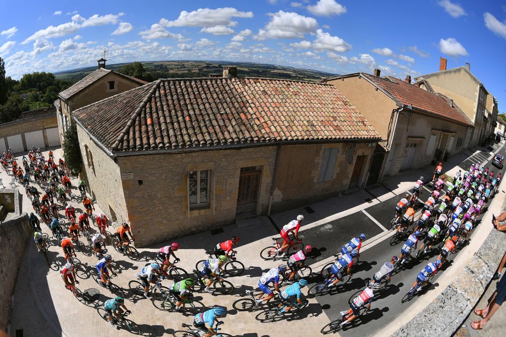 ROCAMADOUR FRANCE AUGUST 04 Start Elia Viviani of Italy and Team Cofidis Miguel ngel Lpez Moreno of Colombia and Astana Pro Team Richie Porte of Australia and Team Trek Segafredo Aleksandr Vlasov of Russia and Astana Pro Team Egan Bernal of Colombia and Team Ineos Orange Leader Jersey Lectoure Village Peloton Landscape during the 44th La Route dOccitanie La Depeche du Midi 2020 Stage 4 a 195km stage from Lectoure to RocamadourCauvaldorLot 295m RouteOccitanie RDO2020 on August 04 2020 in Rocamadour France Photo by Justin SetterfieldGetty Images