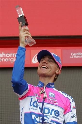 Damiano Cunego delights in some podium time after winning the Vuelta stage eight.