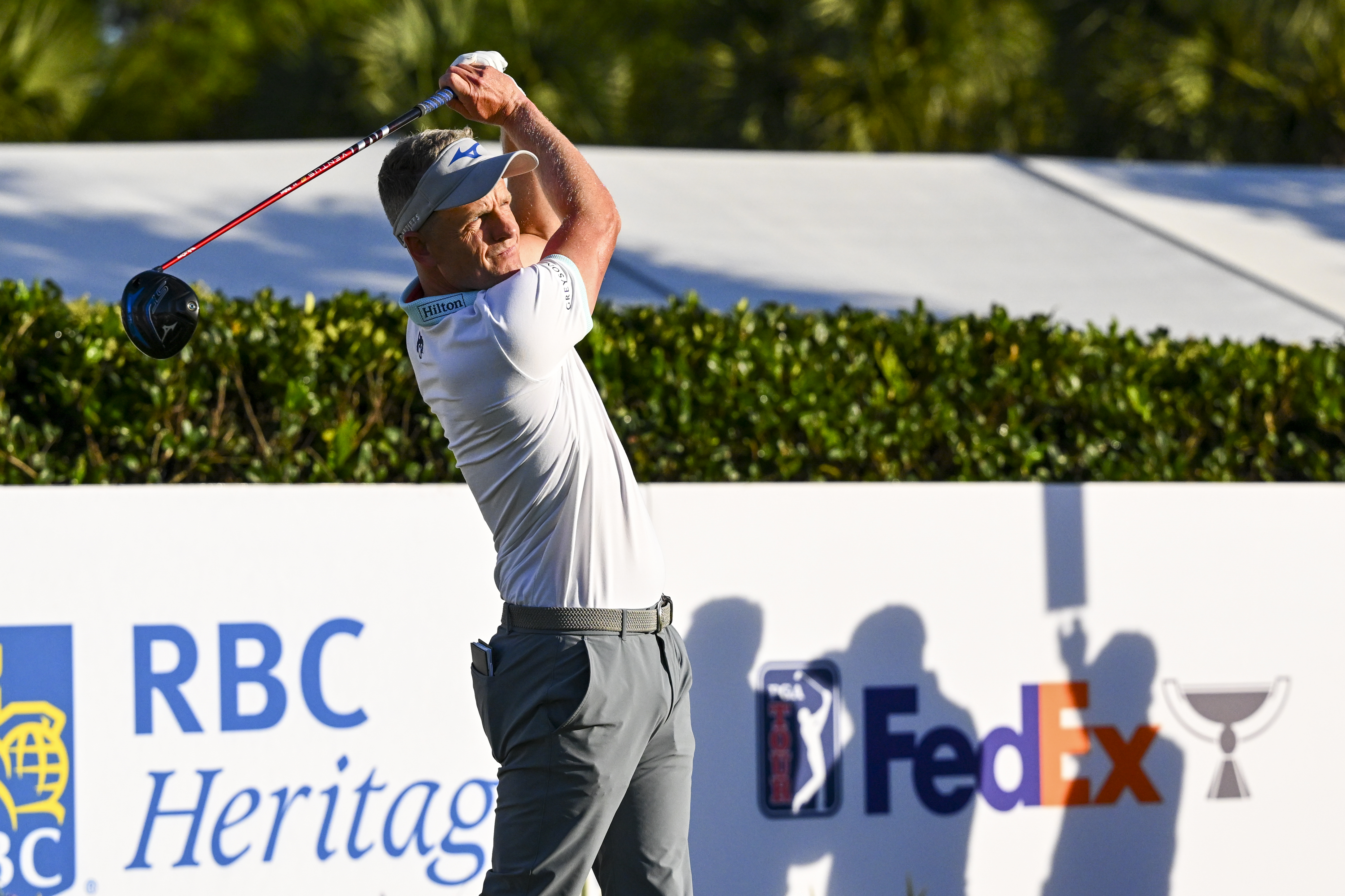 Luke Donald hits a driver off the tee