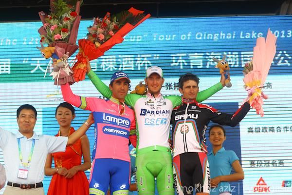 Tour of Qinghai Lake stage 8 podium (L-R): Maximiliano Richeze, Sacha Modolo and Rico Rogers