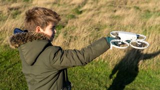 DJI Flip landing in boys hand