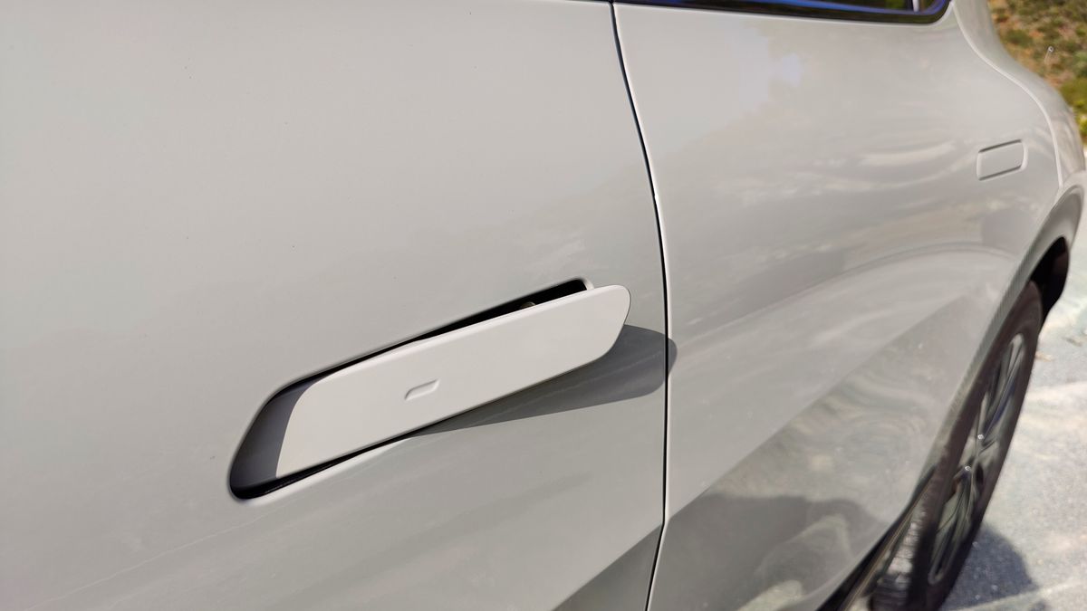 Close up of the protruding door handle on Kia EV6
