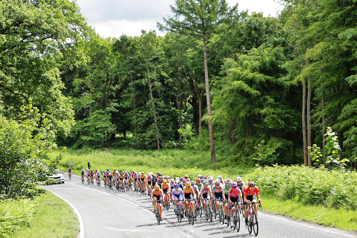 Picture by Alex Whitehead/SWpix.com - 08/06/2022 - Cycling - The Womenâ€™s Tour 2022 - Stage Three - Tewkesbury to Gloucester, England - The Peloton rolling through the Gloucestershire countryside