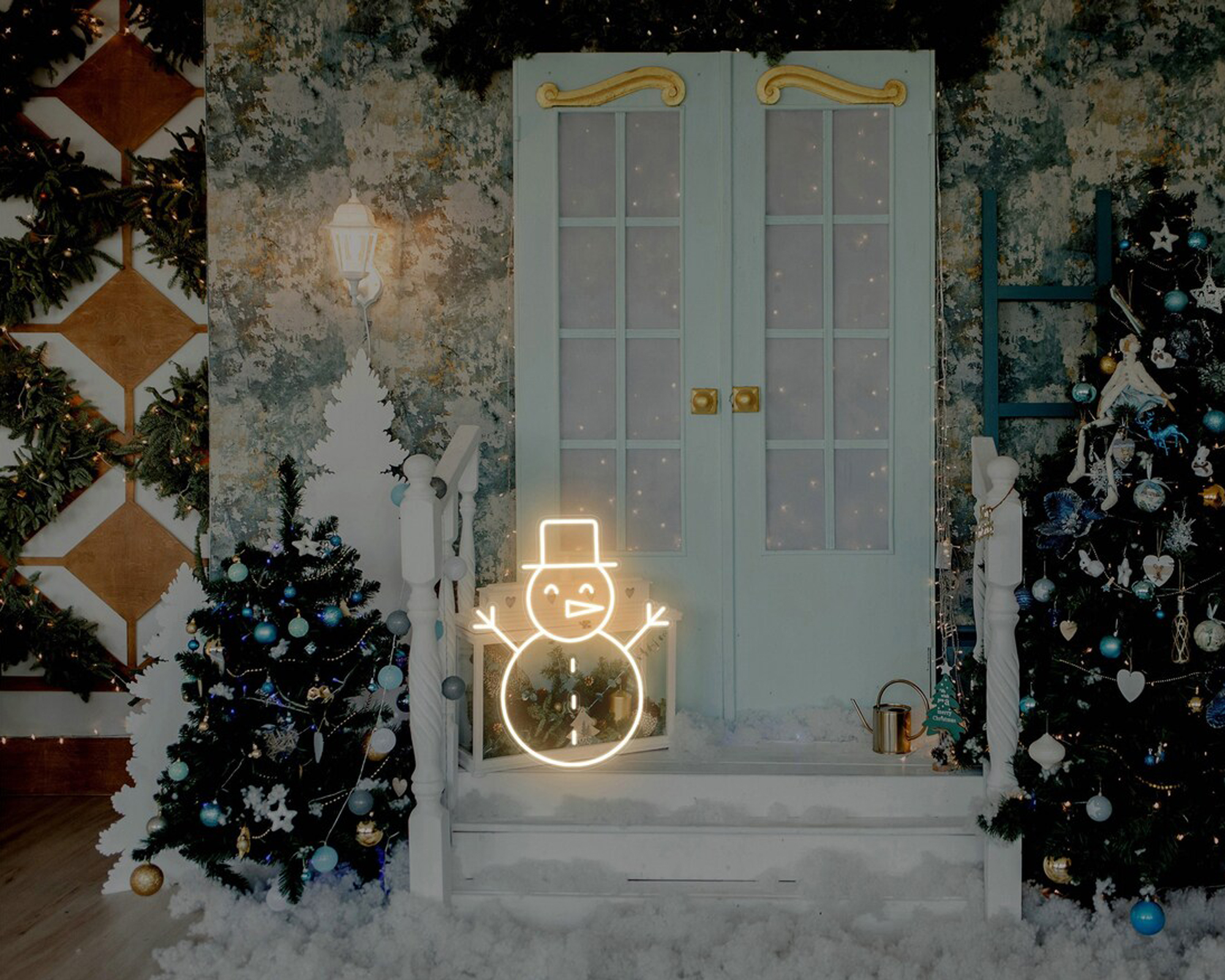 neon snowman light on a porch