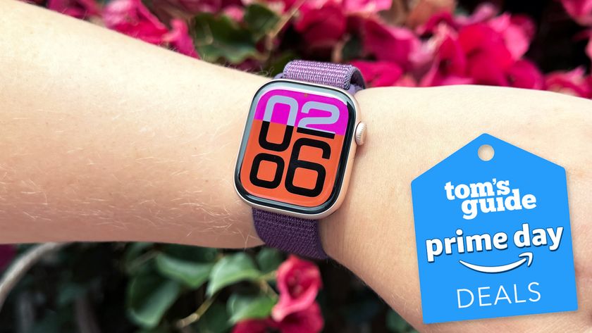 the apple watch 10 photographed on someone&#039;s arm with the home screen visible and a tom&#039;s guide prime day deals badge
