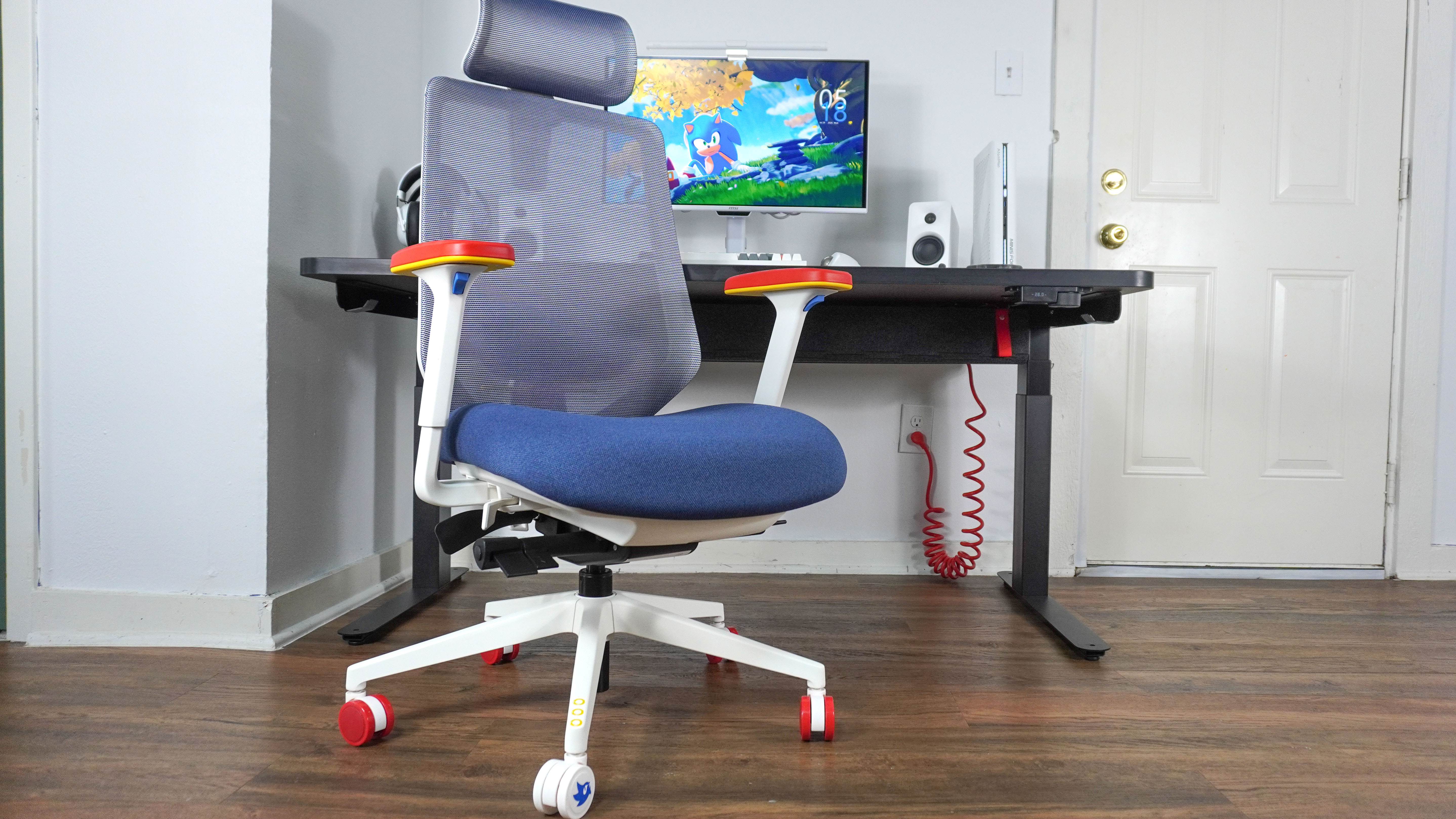 The Branch Ergonomic Chair Pro: Sonic the Hedgehog Edition in front of a desk