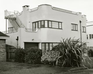 frinton park estate book image showing white modernist villa in black and white