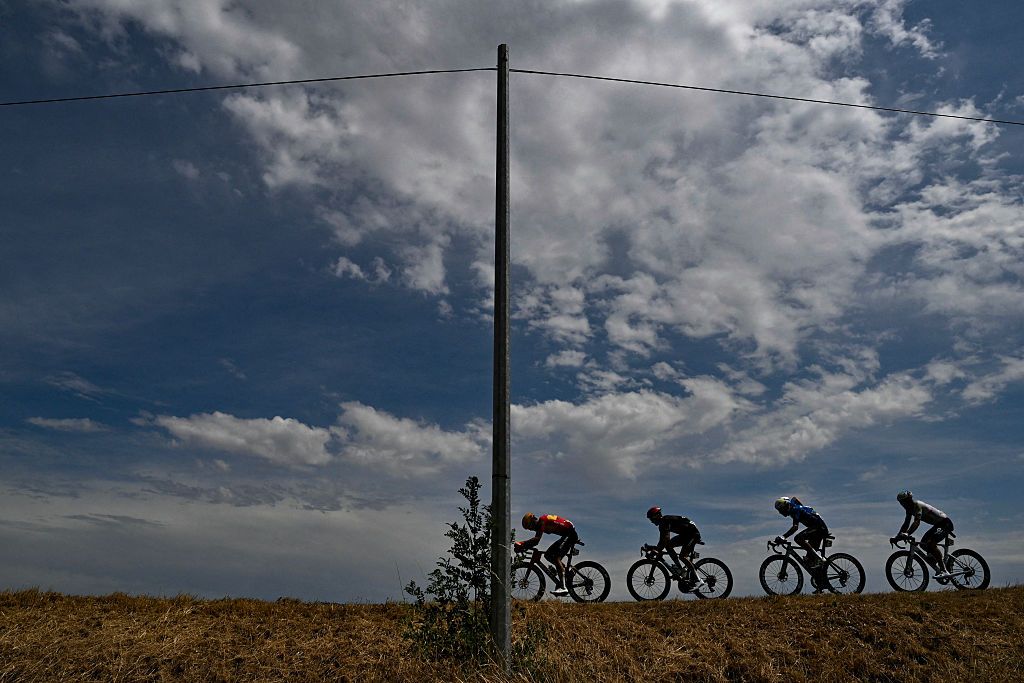 (From L) Uno-X Mobility team's Danish rider Anthon Charmig, Tudor Pro Cycling Team's French rider Julian Alaphilippe, Movistar Team's Portuguese rider Nelson Oliveira and TotalEnergies team's French rider Mathis Le Berre cycle in a breakaway during the 11th stage of the 113th edition of the Tour de France cycling race, 161,3 km between Vichy and Nevers in central France, on July 15, 2026. (Photo by Jeff PACHOUD / AFP)