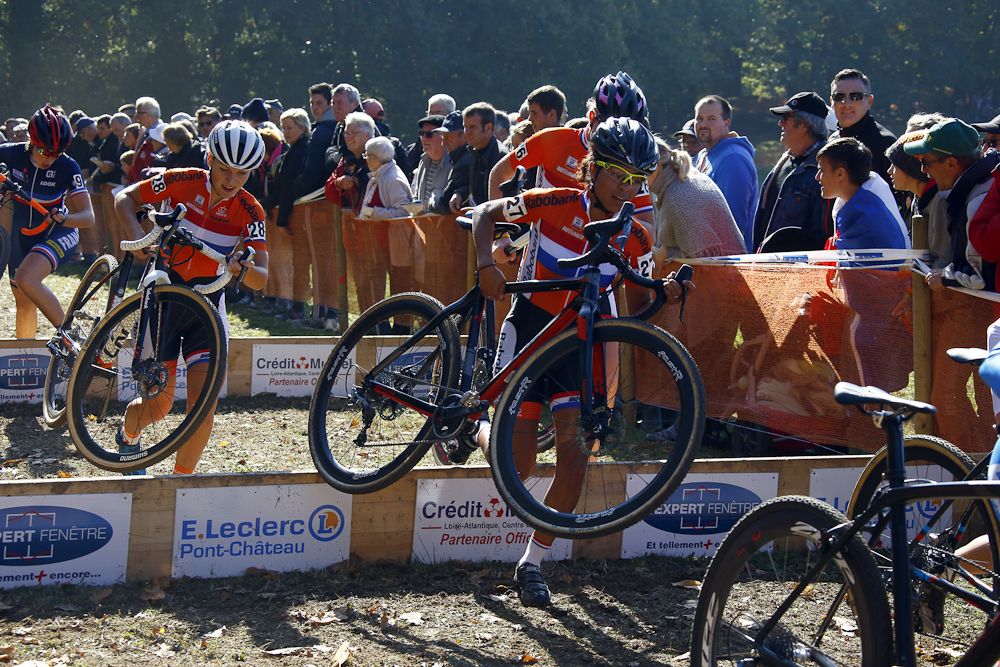 Dutch riders go over the barriers during the European championships