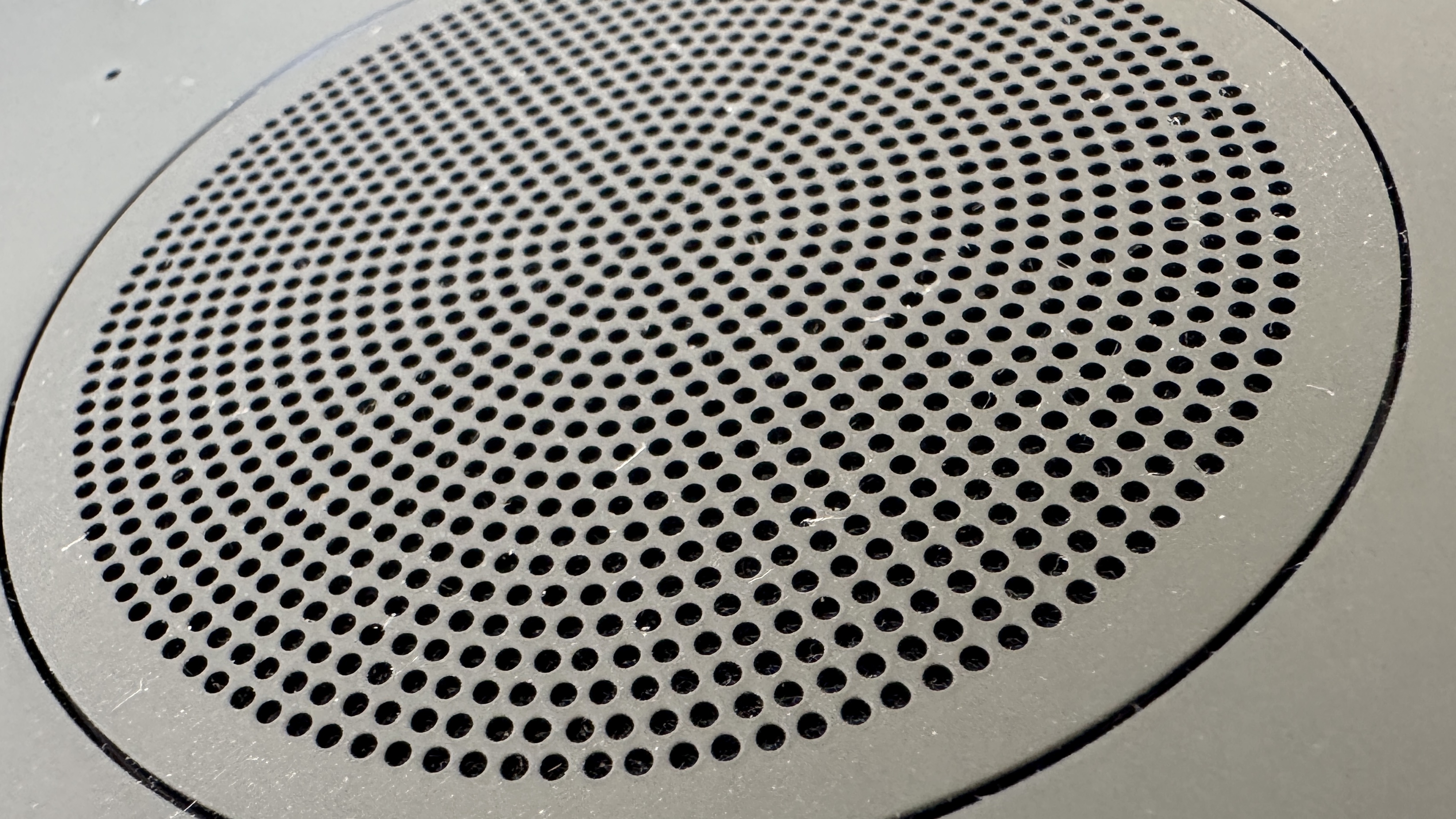 Bose Lifestyle Ultra speaker on a white table