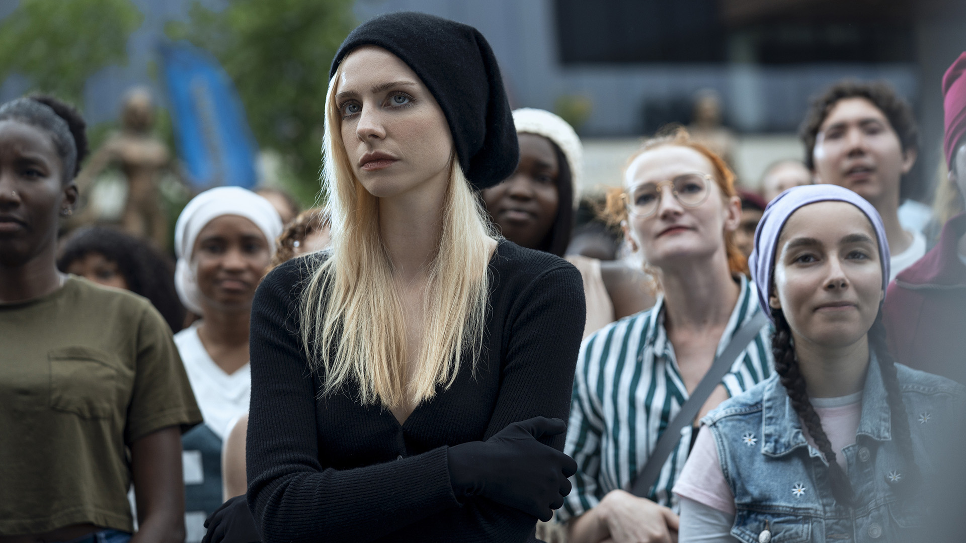 Cate Dunlap standing in a crowd of people in Gen V season 2