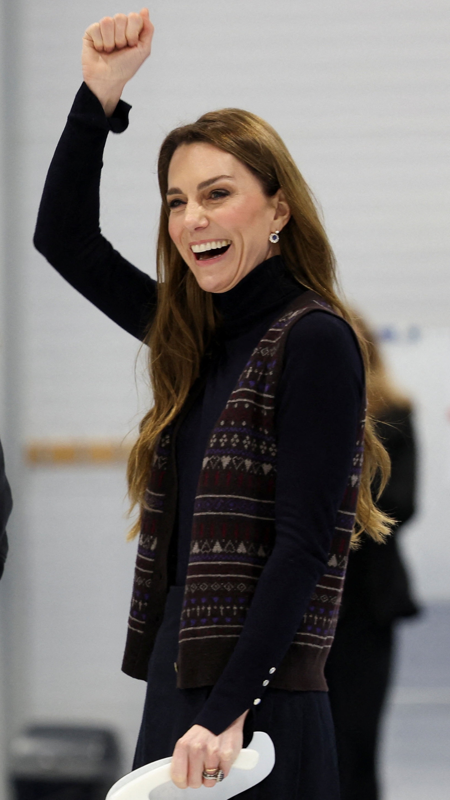 Catherine, Princess of Wales reacts while participating in curling ahead of the Winter Olympic Games at the National Curling Academy on January 20, 2026