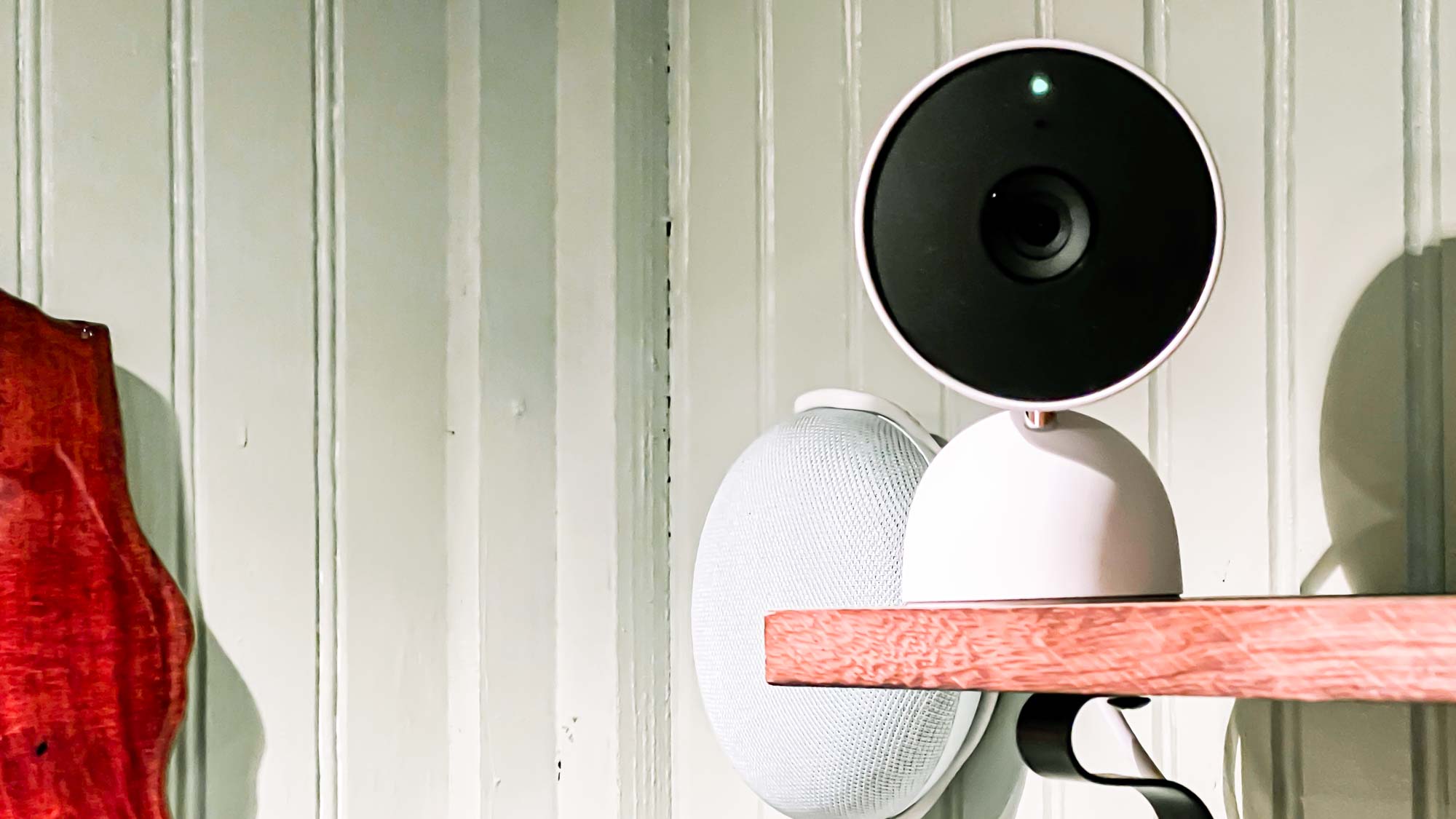 Nest Cam (indoor, wired) on bookshelf