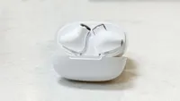 The Lasuney True Wireless Earbuds in their charging case