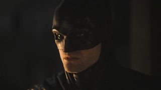 Batman intimidating Penguin in The Batman