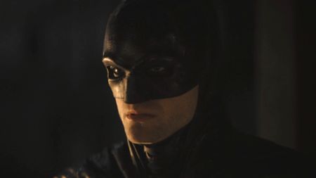 Batman intimidating Penguin in The Batman