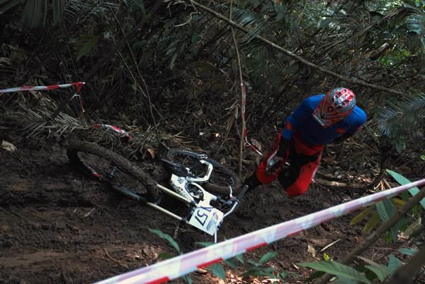 Ha The Long (Vietnam) crashed during the junior men's downhill.