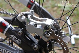 The differential piston diameters on Shimano's revamped Saint four-piston caliper is expected to be both quiet and powerful