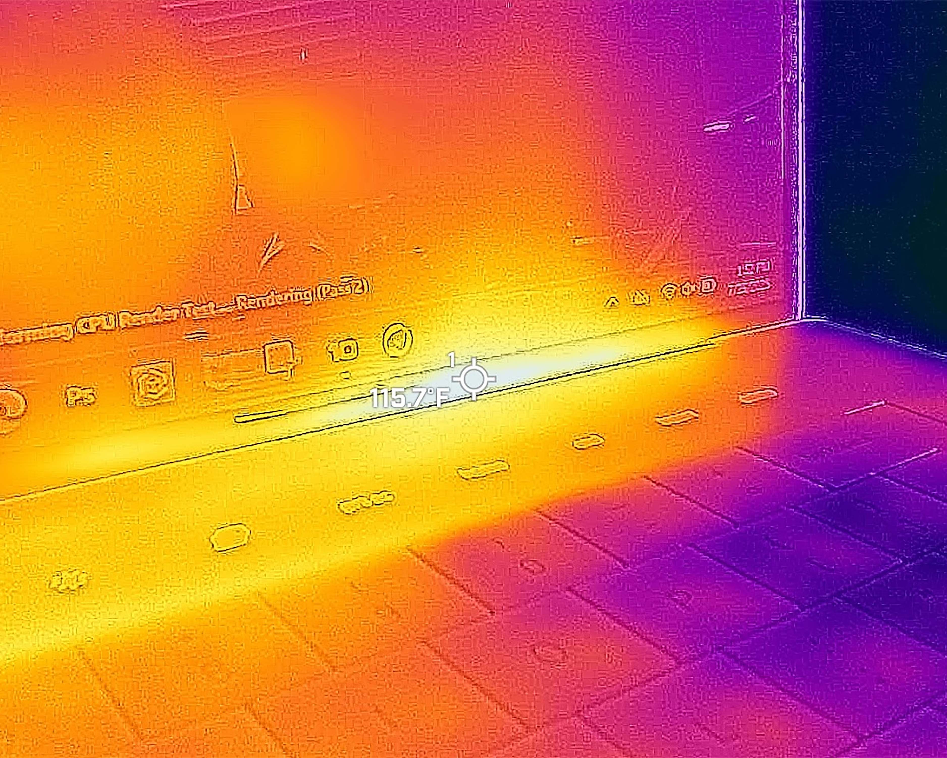 Pictures taken with a thermal camera of the Dell 16 Premium showing that the area above the keyboard peaks at 115 degrees F.