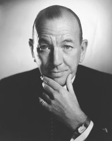 Head and shoulders portrait photo of British actor Noel Coward (1899-1973) with his hand massaging his chin. Ca. 1950. (Photo by �� John Springer Collection/CORBIS/Corbis via Getty Images)