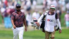 JJ Spaun and his caddie walk at the US Open