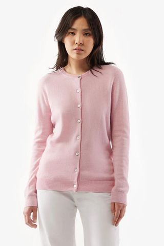 valentine's gifts for her - woman wearing pink cardigan