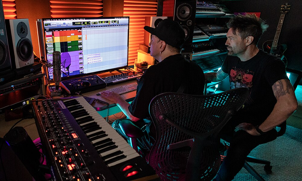 Shot of two musicians using Avid&#039;s audio editor