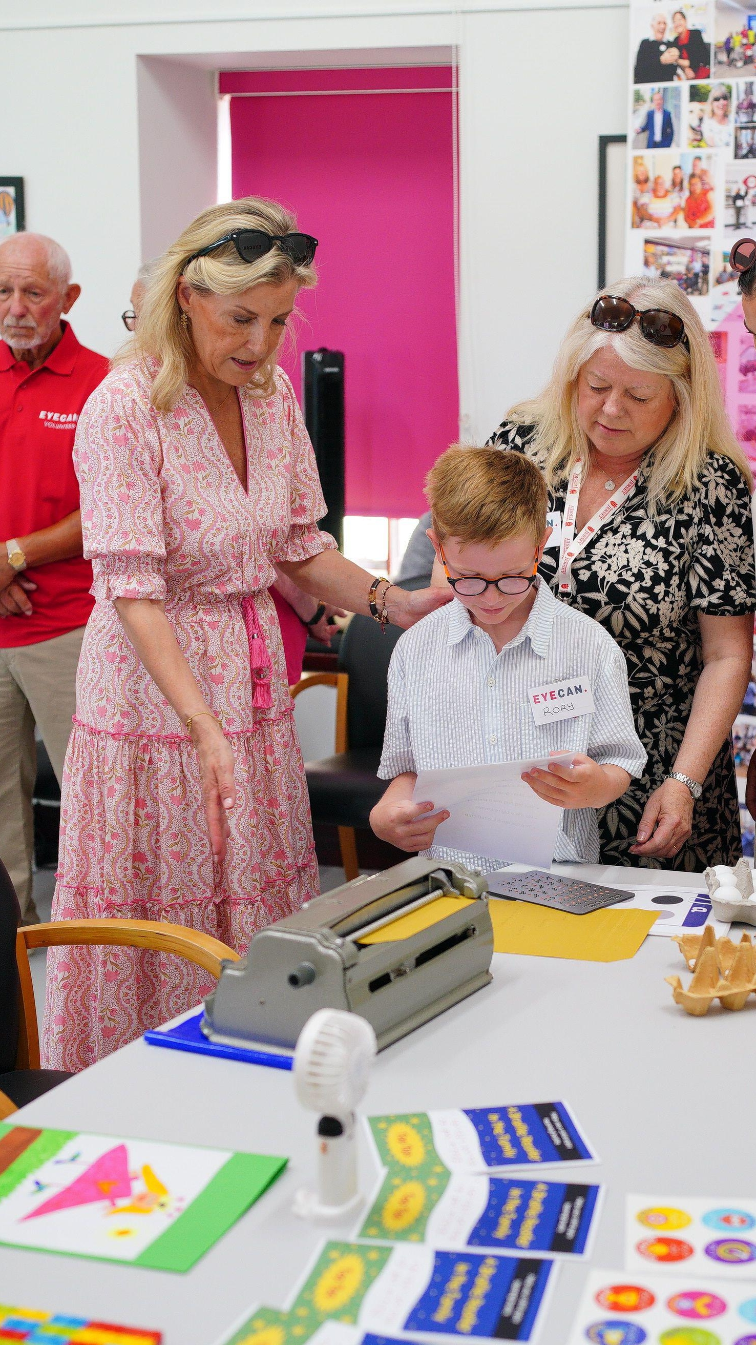 The Duchess of Edinburgh talking to families during a visit to EYECAN