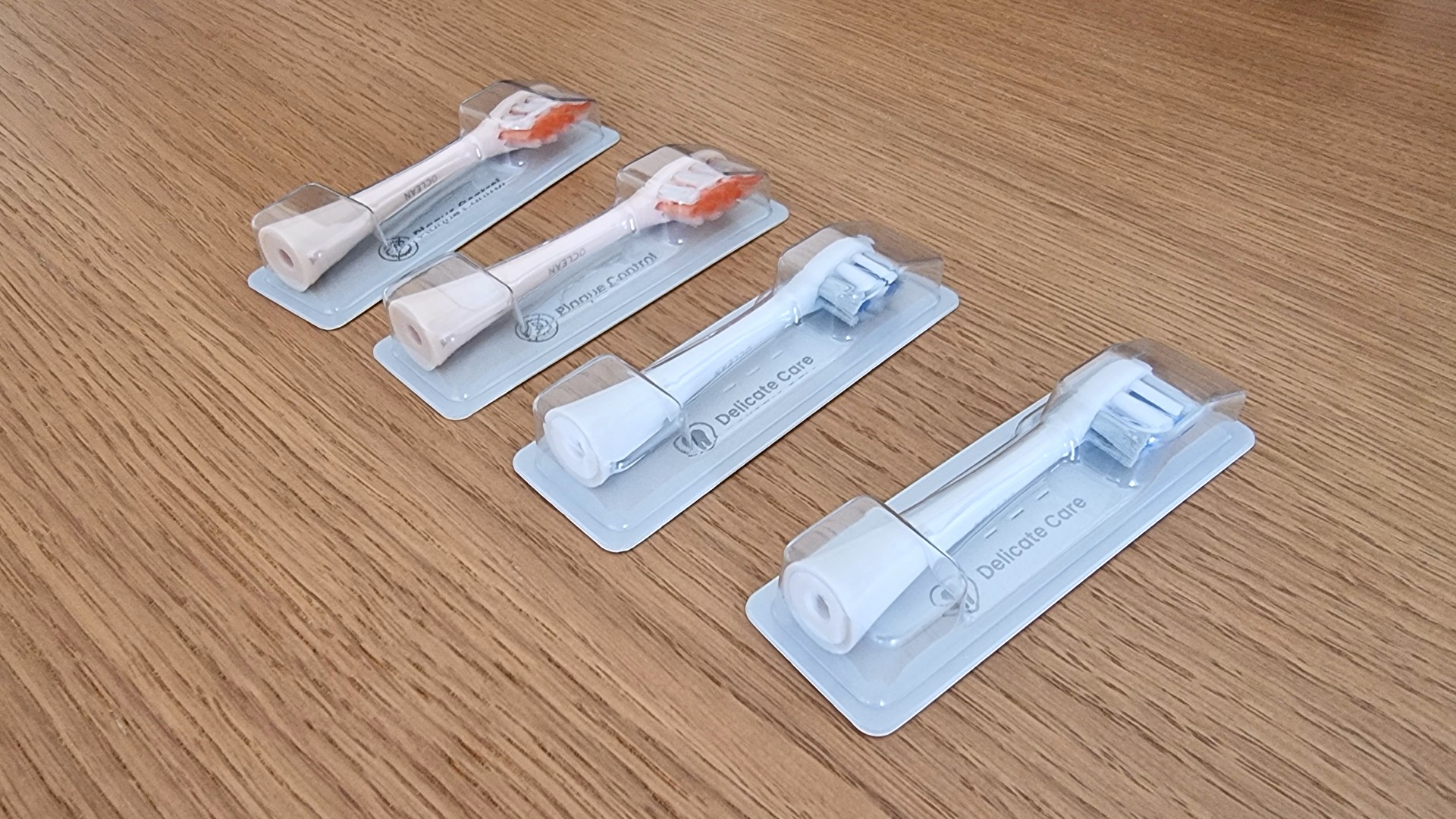 All four brush heads for the Oclean X Pro Digital S electric toothbrush