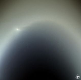 Val Klavans also created this Cassini image, showing the Saturnian moon Enceladus inside the E ring.