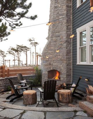 round patio garden idea with fire pit and seating