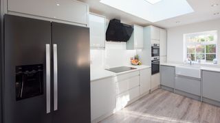 Refrigerator with ice maker in modern kitchen