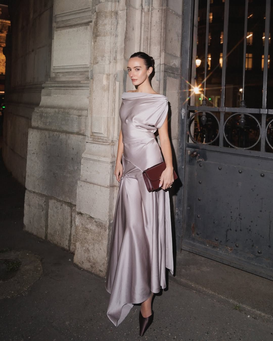 @livvperez wearing a purple silk gown