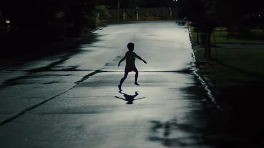 A child runs in the middle of the road in the trailer for Weapons.