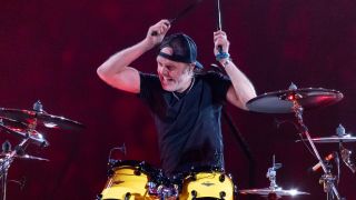Lars Ulrich drumming on stage