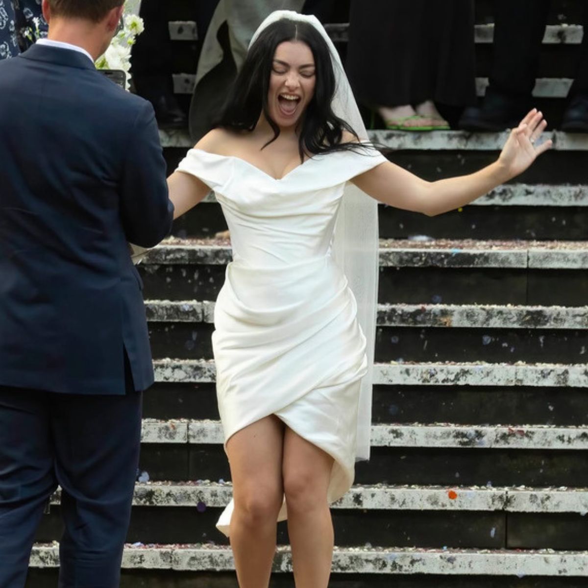 Charli XCX wearing wedding mini dress by Vivienne Westwood