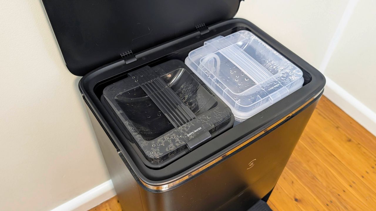 Ecovacs X5 Pro Omni clean and dirty water containers installed in the base station
