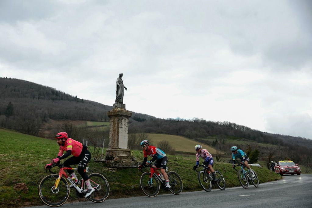 (From L to R) EF Education-Easypost's Swiss cyclist Stefan Bissegger, Lotto-DSTNY's Belgian cyclist Jasper de Buyst, TotalEnergies' French cyclist Mathieu Burgaudeau and Astana Qazaqstan Team's Italian cyclist Christian Scaroni ride in a breakaway during the 4th stage of the Paris-Nice cycling race, 183 km between Chalon-sur-Saone and Mont Brouilly, on March 6, 2024. (Photo by Thomas SAMSON / AFP)