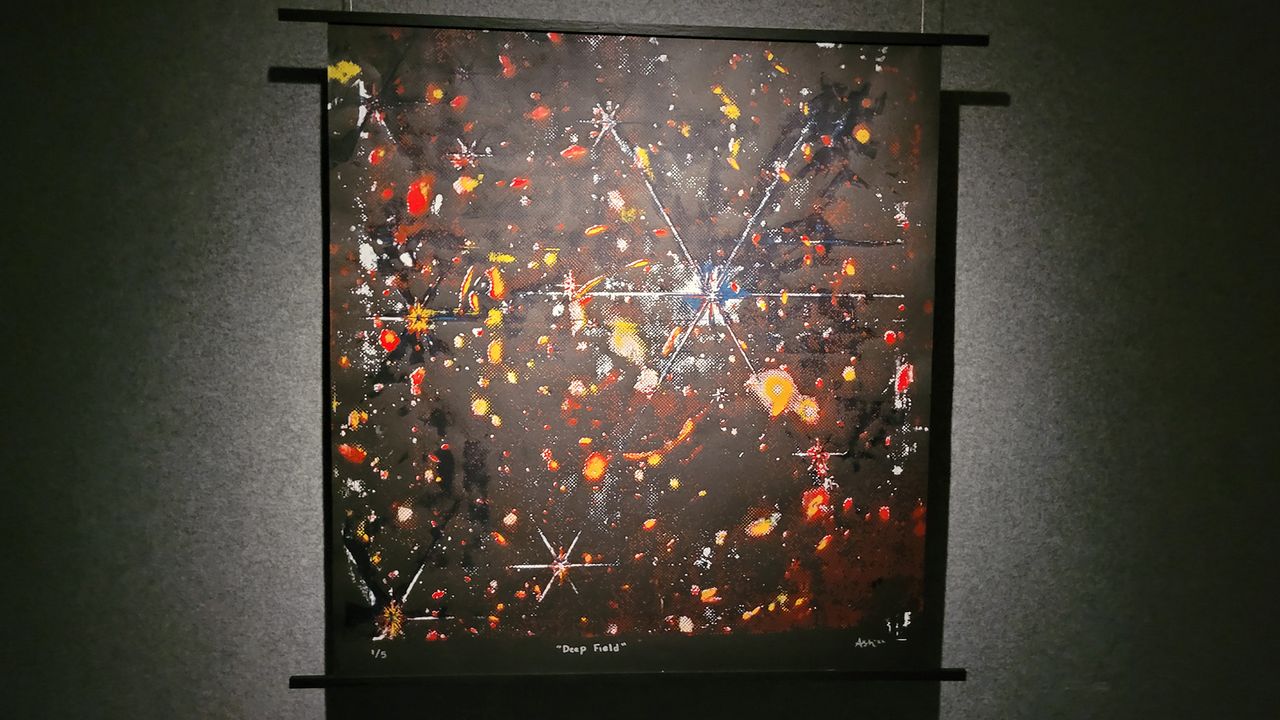 "Deep Field" silkscreen artwork on display at Ashley Zelinkskie's "Unfolding the Universe: First Light" exhibit.