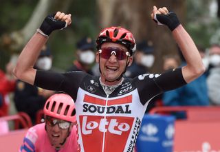 Team Lotto rider Belgiums Tim Wellens celebrates as he crosses the finish line of the 14th stage of the 2020 La Vuelta cycling tour of Spain a 2047km race from Lugo to Ourense on November 4 2020 Photo by MIGUEL RIOPA AFP Photo by MIGUEL RIOPAAFP via Getty Images