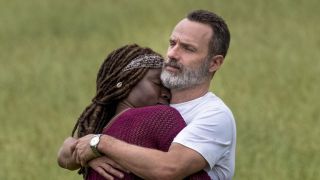 Rick and Michonne hugging in the Walking Dead